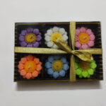 Floating daisy candles box of 6